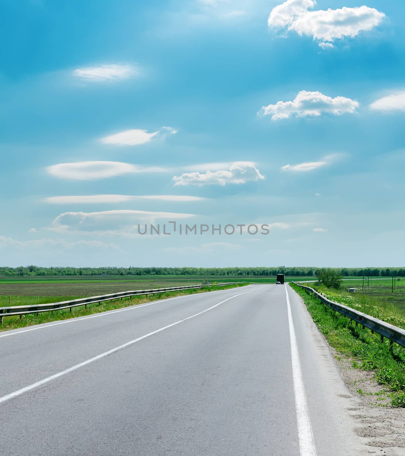 good cloudy sky and road to horizon by mycola