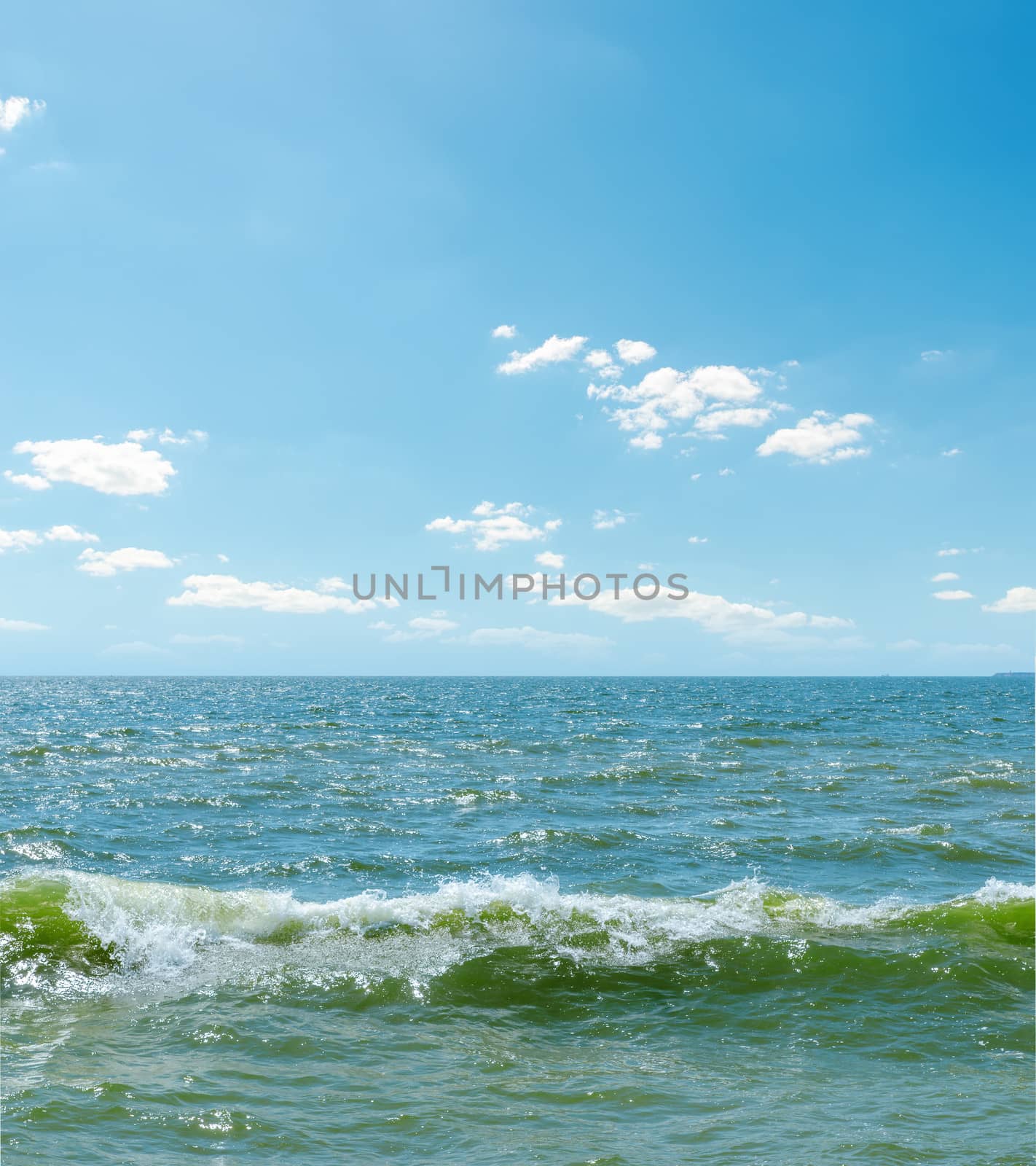 splash on water and blue sky