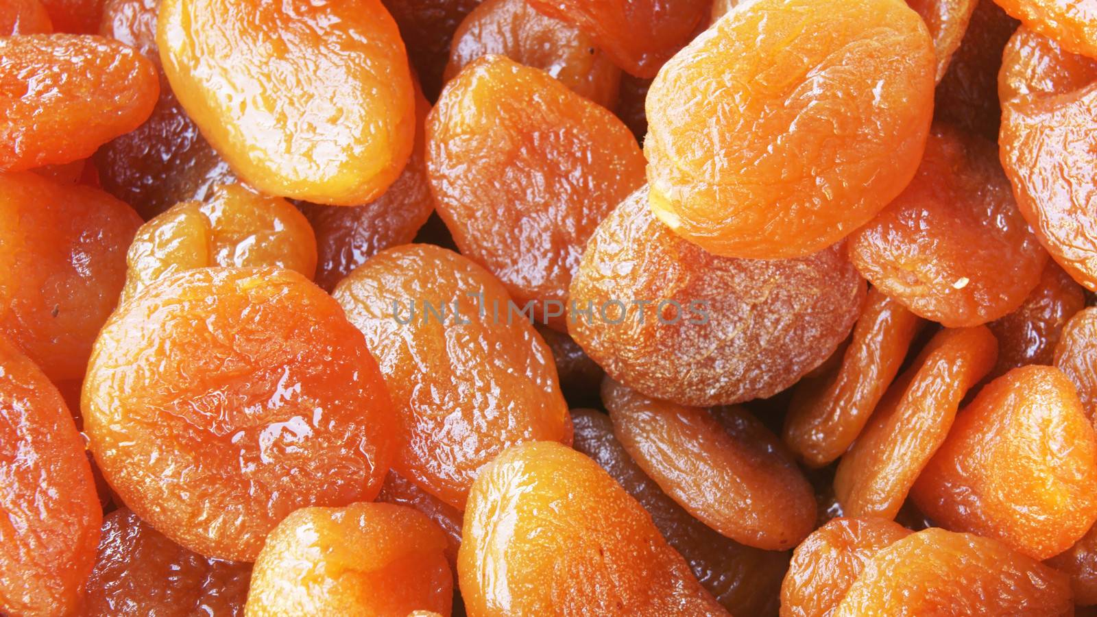  Heap of dried apricots close-up.            