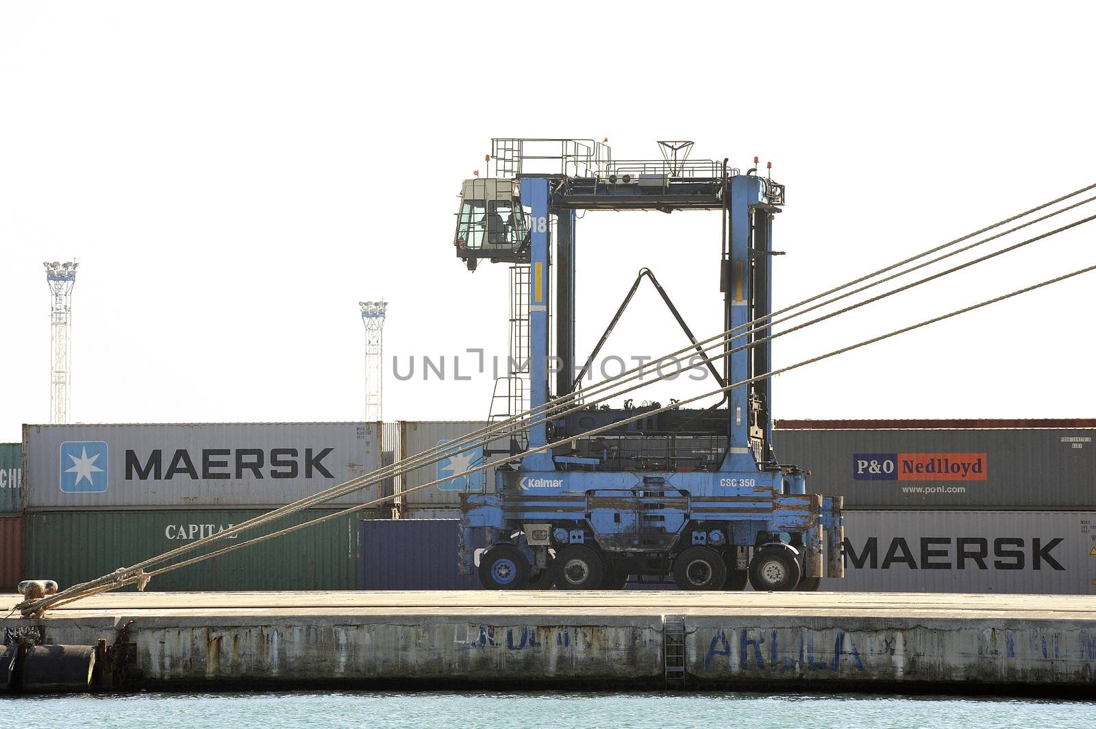 Machines to move the containers on the wearing of Fos-sur-Mer beside Marseille.