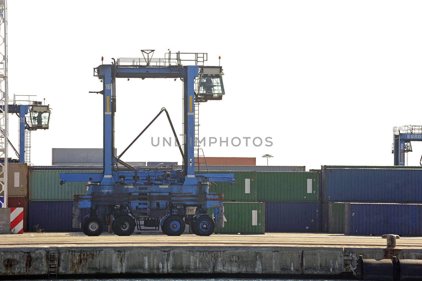 Machines to move the containers on the wearing of Fos-sur-Mer beside Marseille.