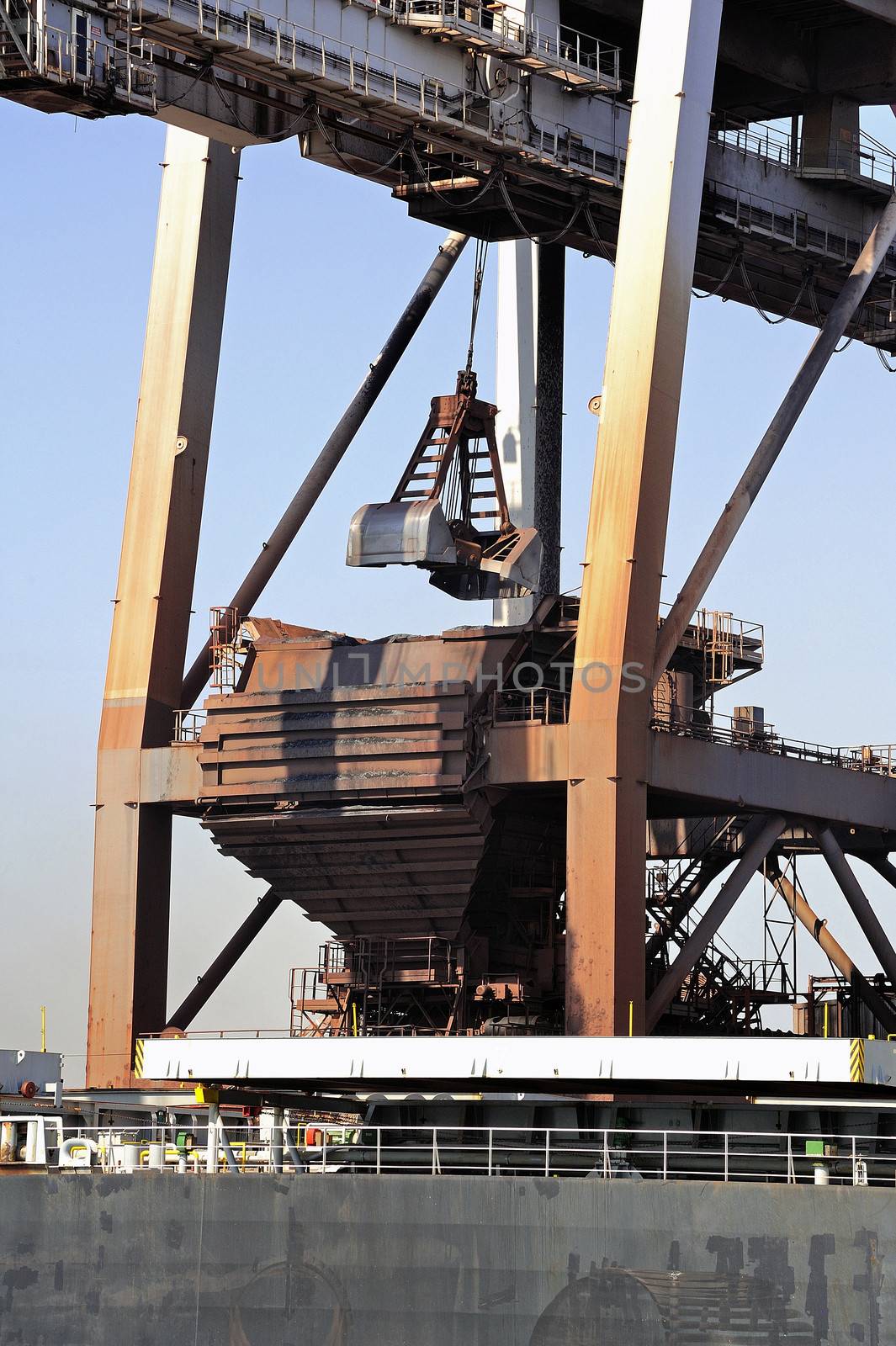 unloading of an ore cargo liner for the steel-works at Fos-sur-Mer beside Marseille.