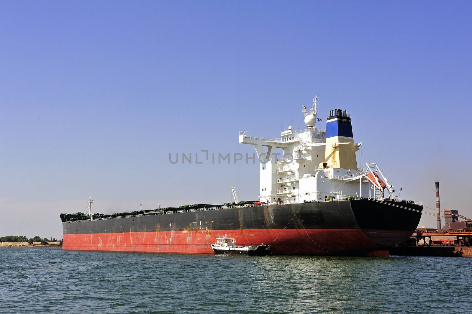 unloading of an ore cargo liner for the steel-works at Fos-sur-Mer beside Marseille.