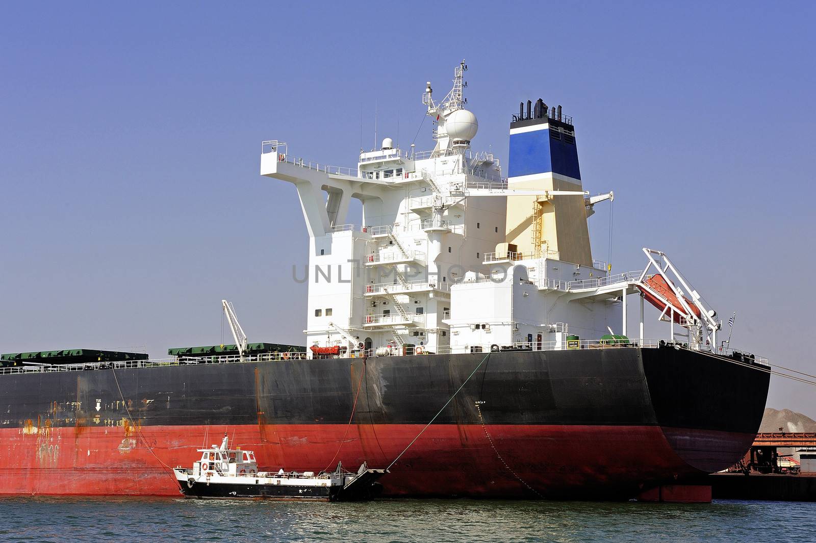 unloading of an ore cargo liner for the steel-works at Fos-sur-Mer beside Marseille.