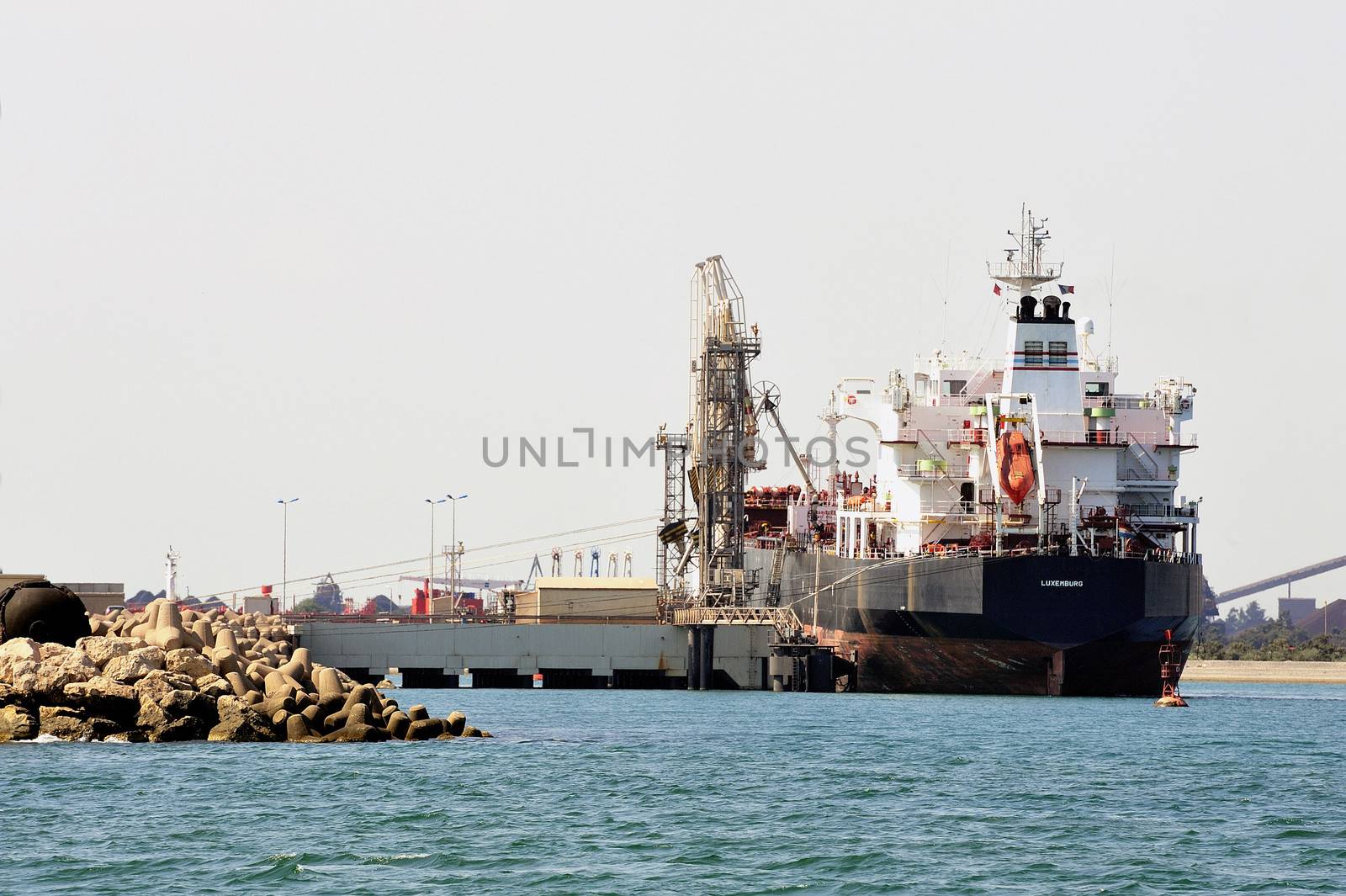 quay tanker to discharge its cargo in France with the wearing of Fos-sur-Mer beside Marseilles