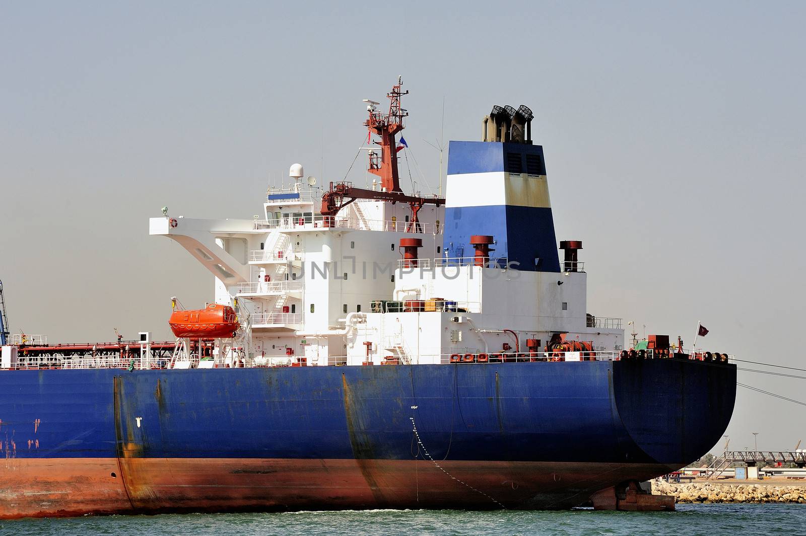 quay tanker to discharge its cargo in France with the wearing of Fos-sur-Mer beside Marseille