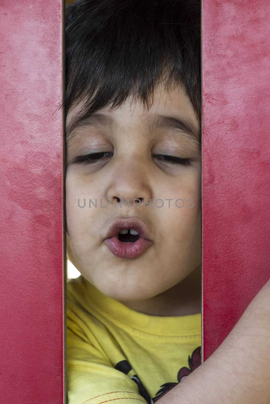 Happy, cute little european baby boy playing at park