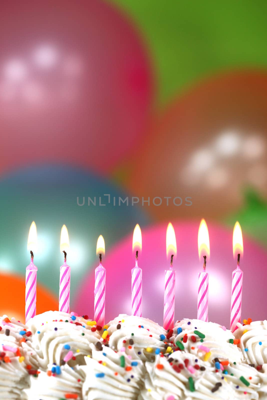 Celebration with Balloons Candles and Cake by tobkatrina
