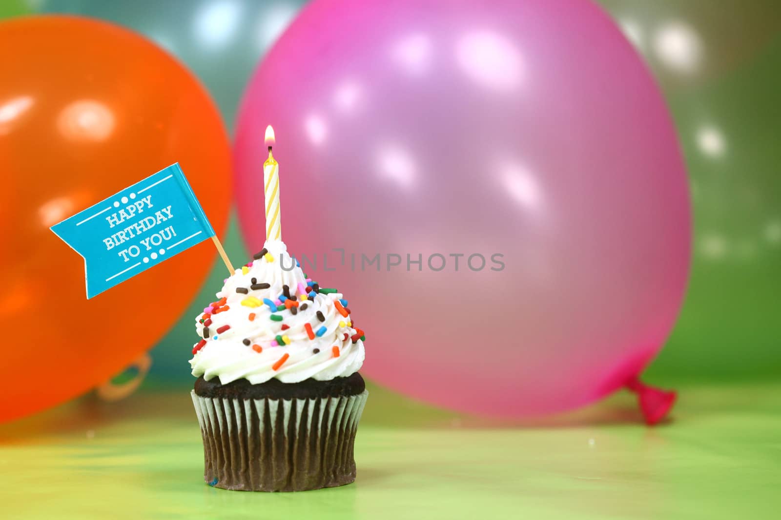 Happy Birthday Celebration with Balloons Candles and Cake