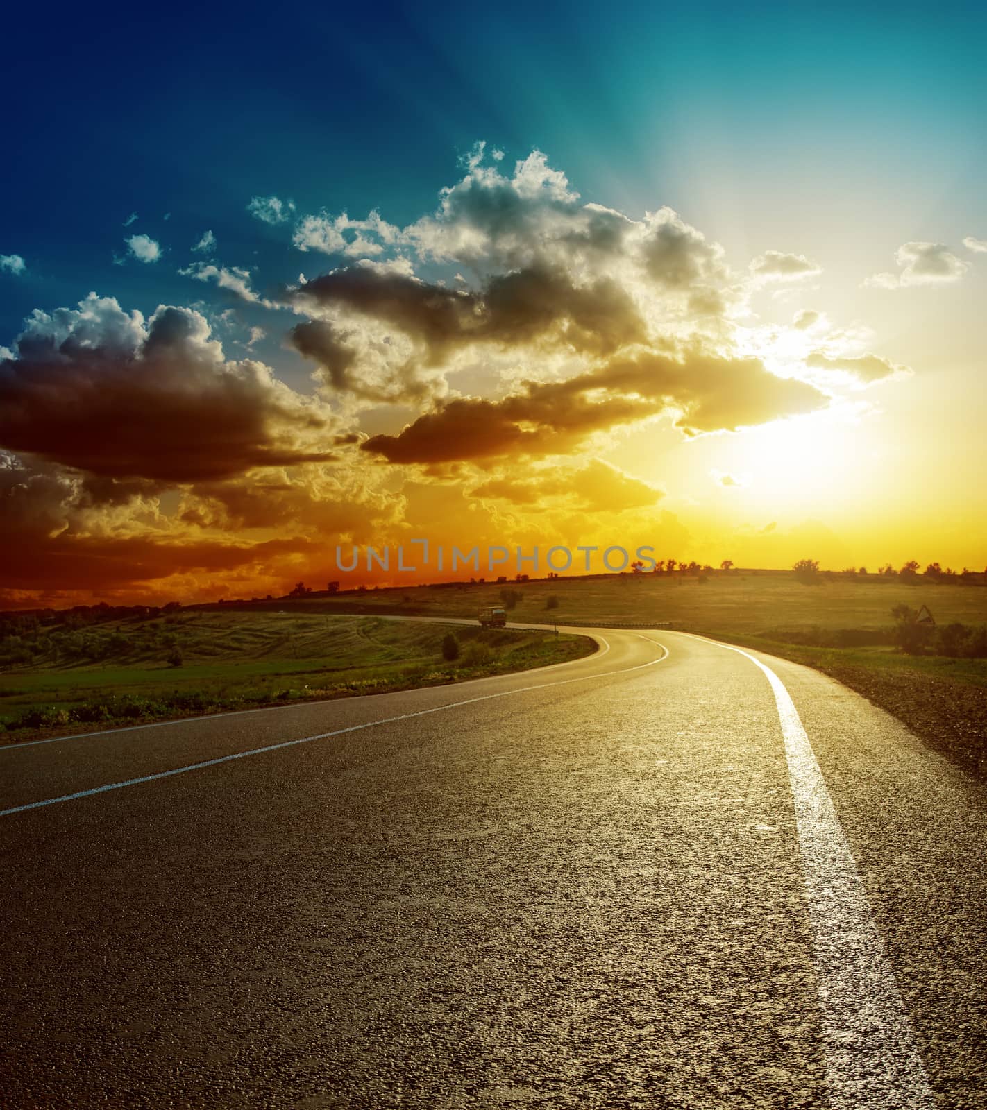 perfect sunset over asphalt road by mycola