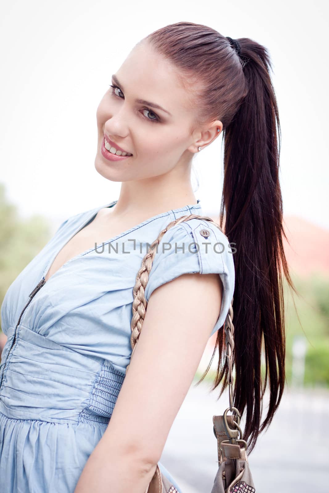 young attraktive happy woman outdoor in summer by juniart