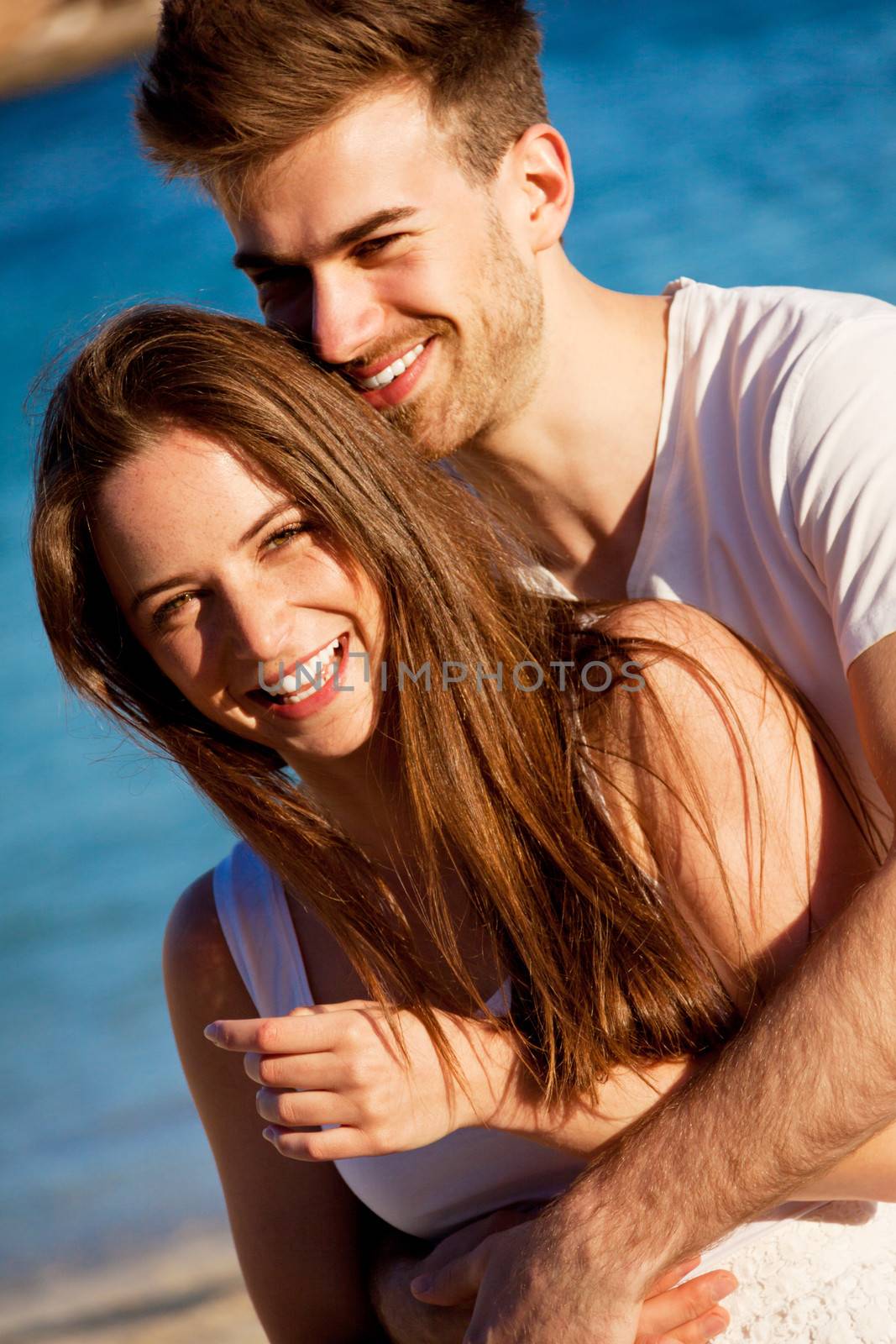 happy young couple having fun in summer holiday vacation love