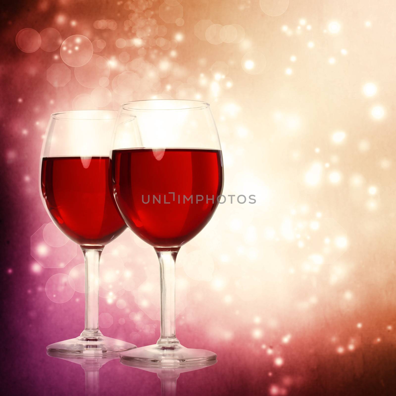 Glasses of Red Wine on a Sparkling Background by melpomene