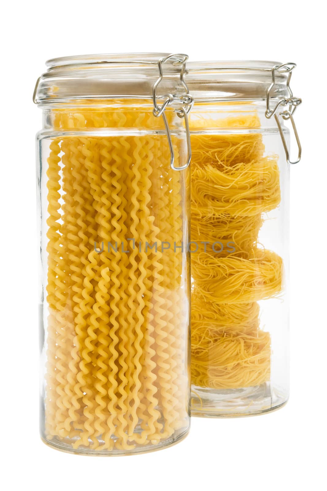 pasta in glass jar on a white background