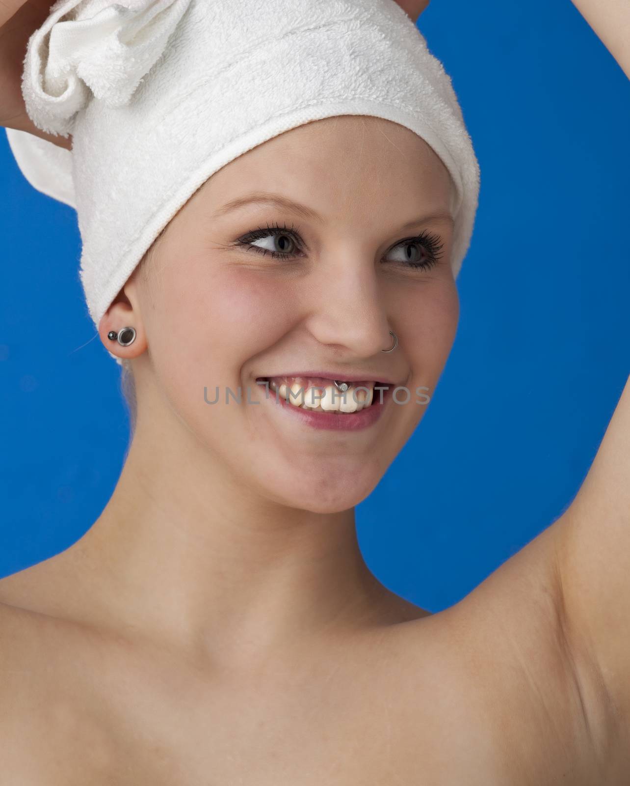 woman in towels during a spa treatment by bernjuer