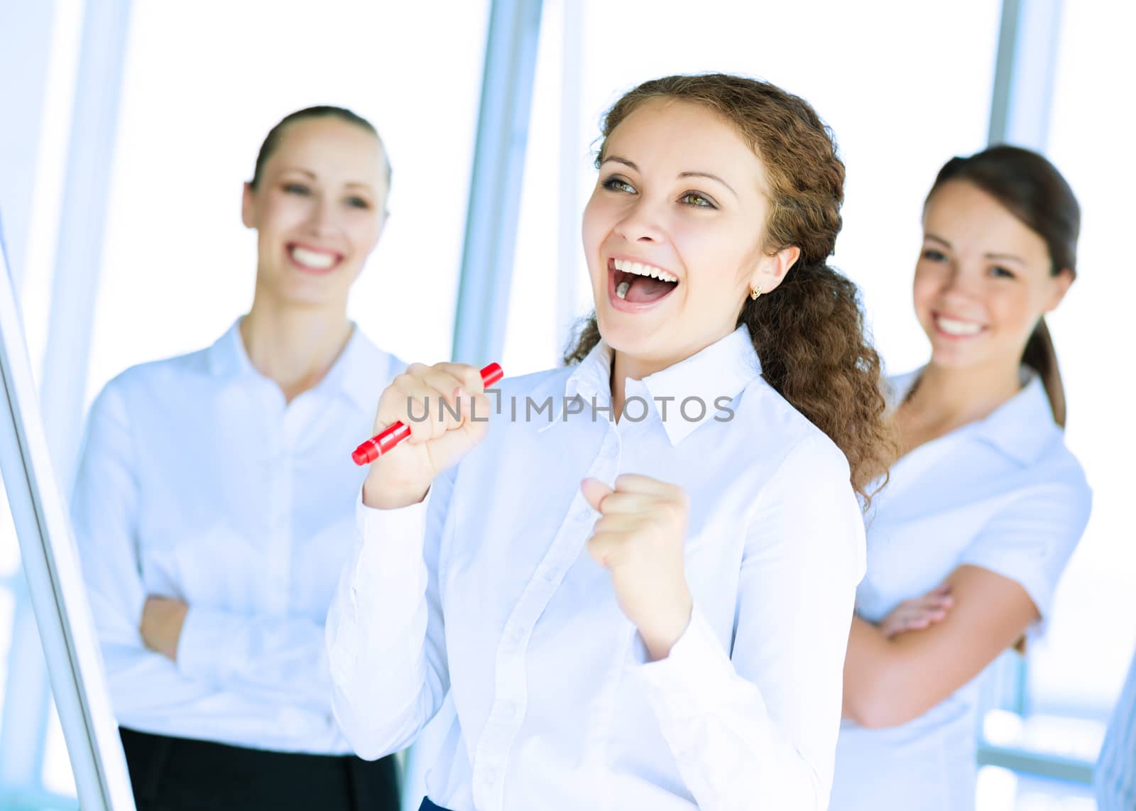 happy business woman standing next to their counterparts outside the flipchart achievements in business