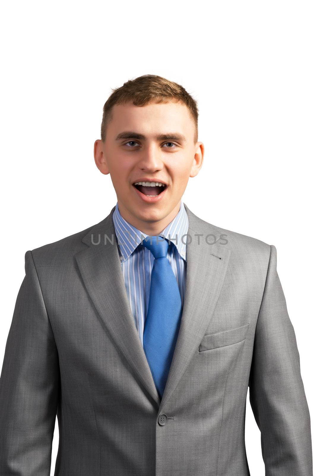 portrait of a young businessman screaming, shouting and looking at the camera, isolated on white background