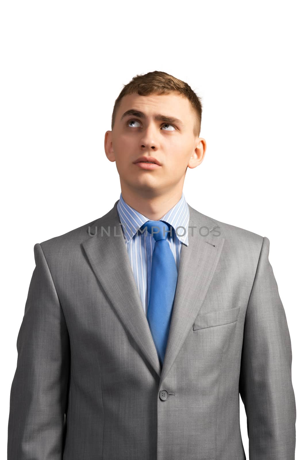 portrait of a young businessman thinking and looking up on gray background, isolated on white background