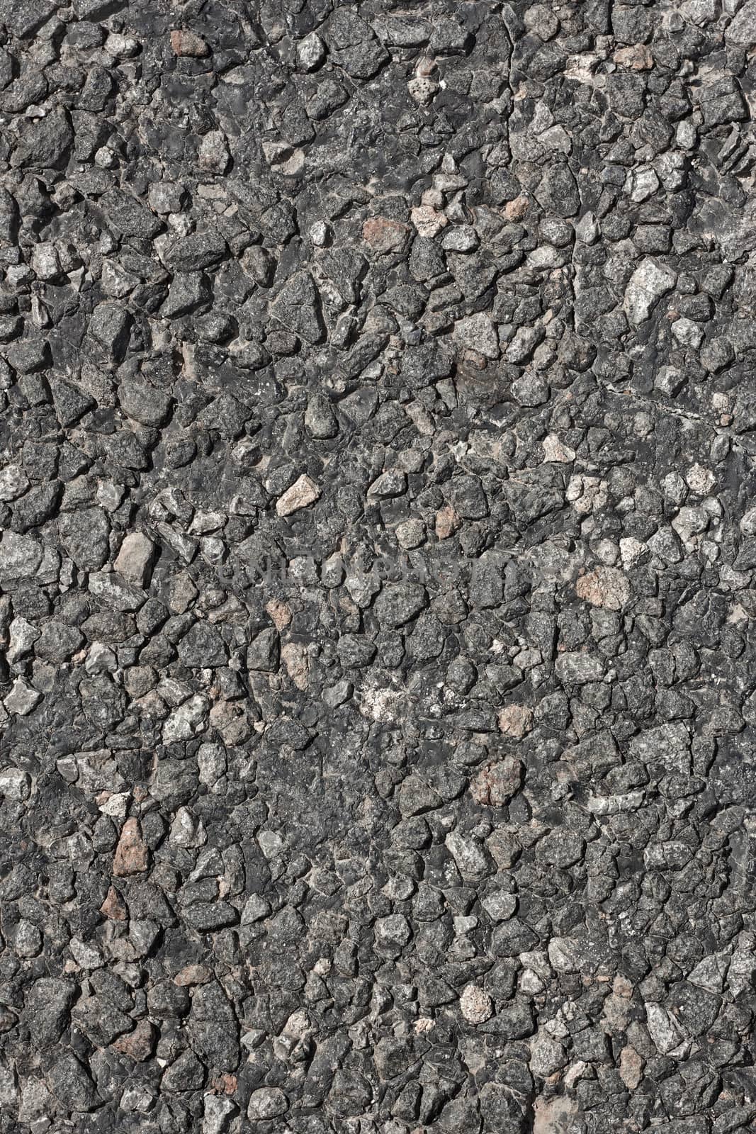 Fragment of asphalt road surface as texture close up 