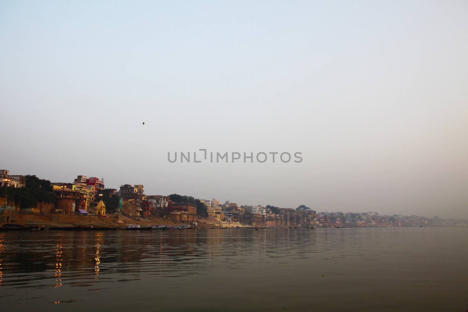 Early morning sunrise panorama of the serene river Ganges near Varanasi, India