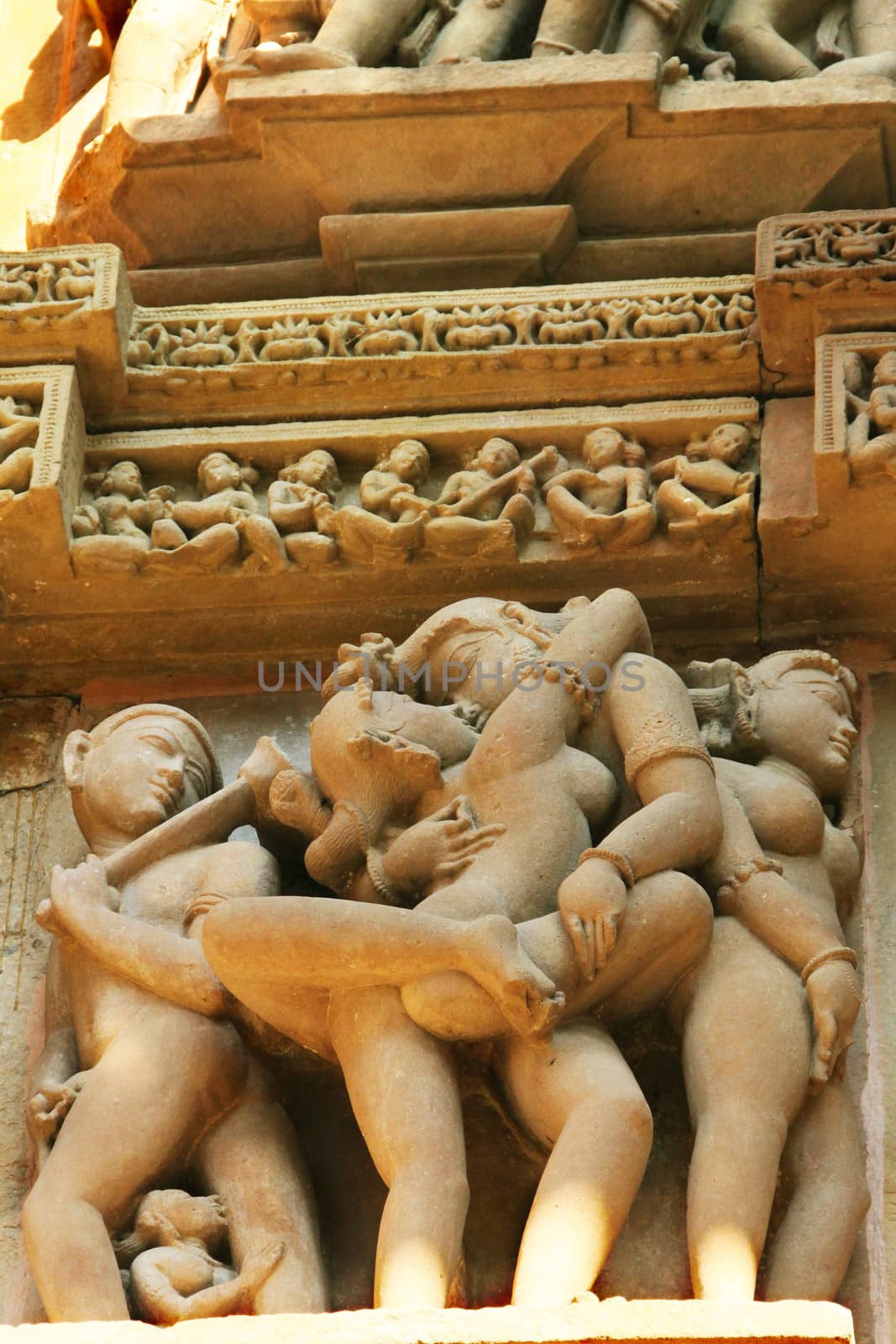 A relief with erotic scene carved on the walls of one of the Kajuraho temple complex in India