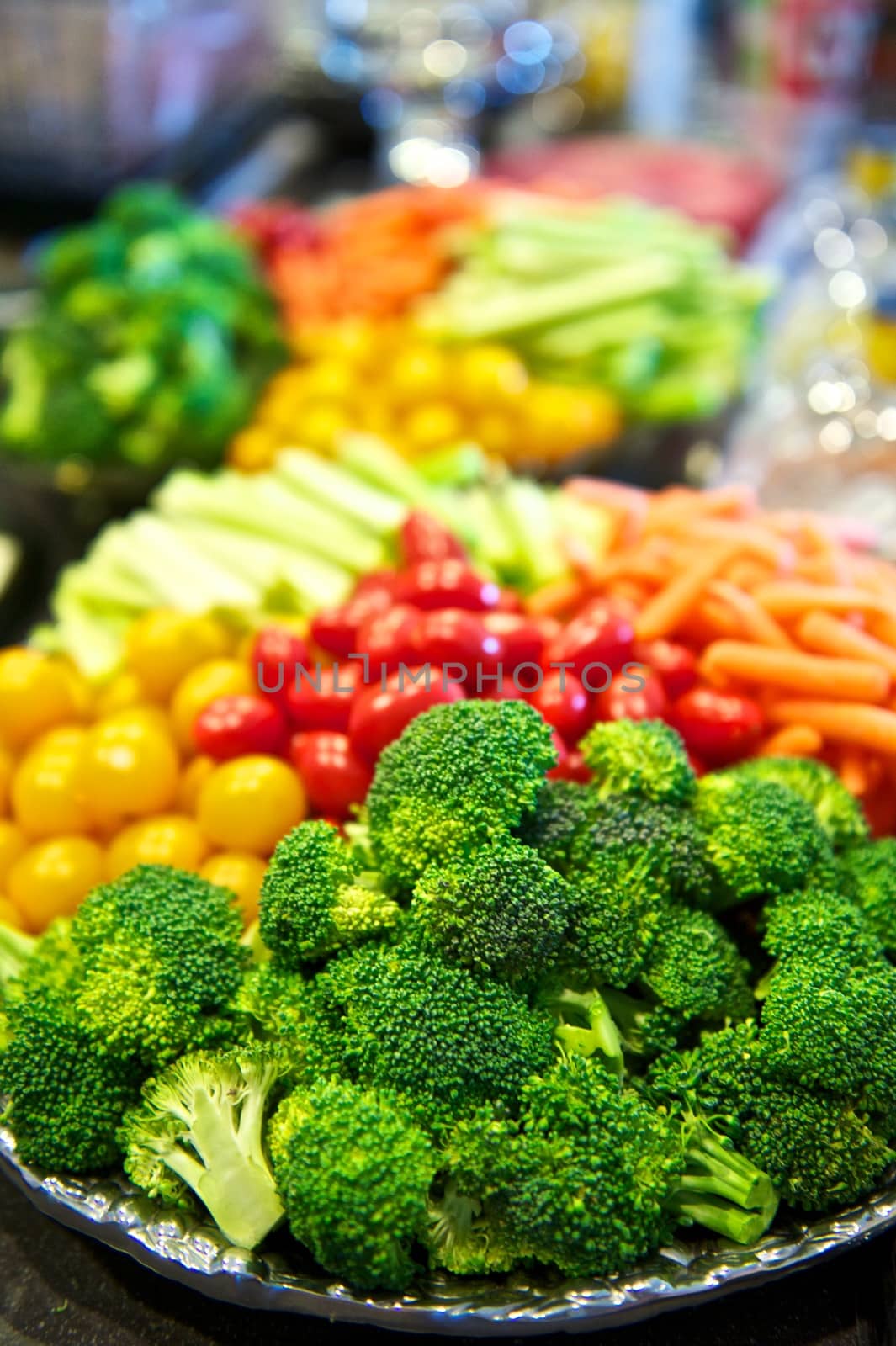 Serving Dish Filled With Broccoli and Other Veggies by pixelsnap