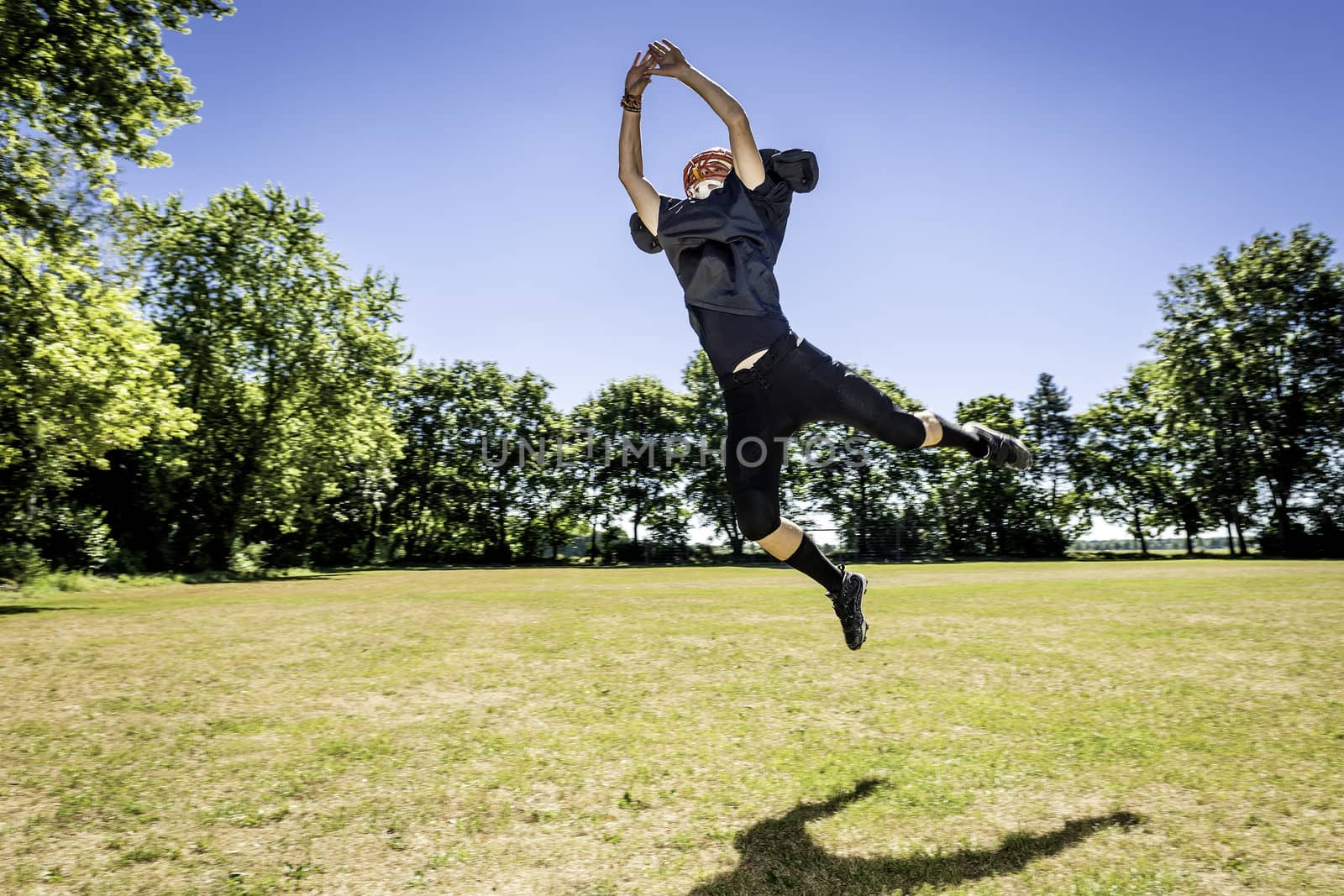 Picture of a jumping American Football Player