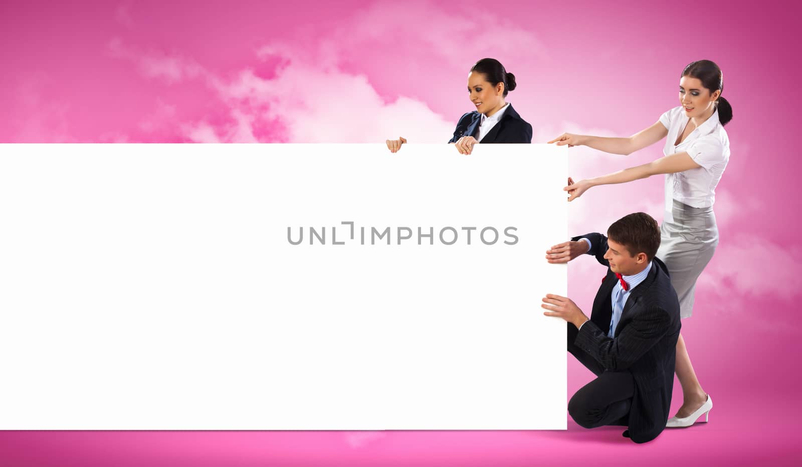 Image of three young people holding blank banner against purple background. Place for text