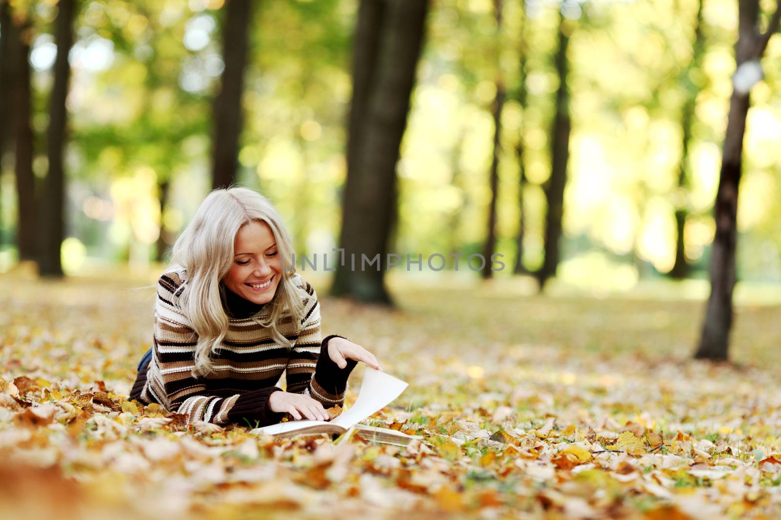 woman read in park by Yellowj