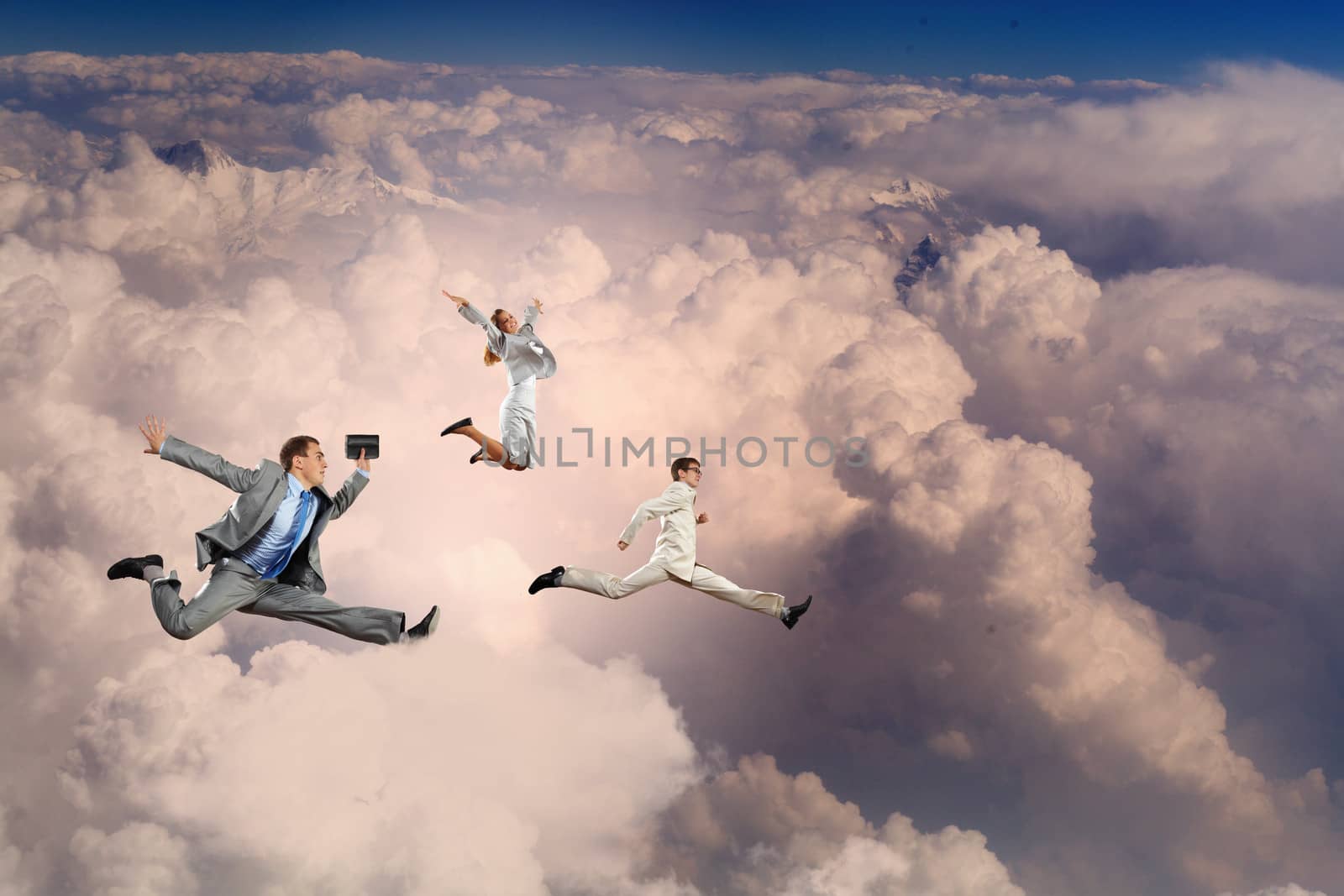 Image of businesspeople jumping high in sky
