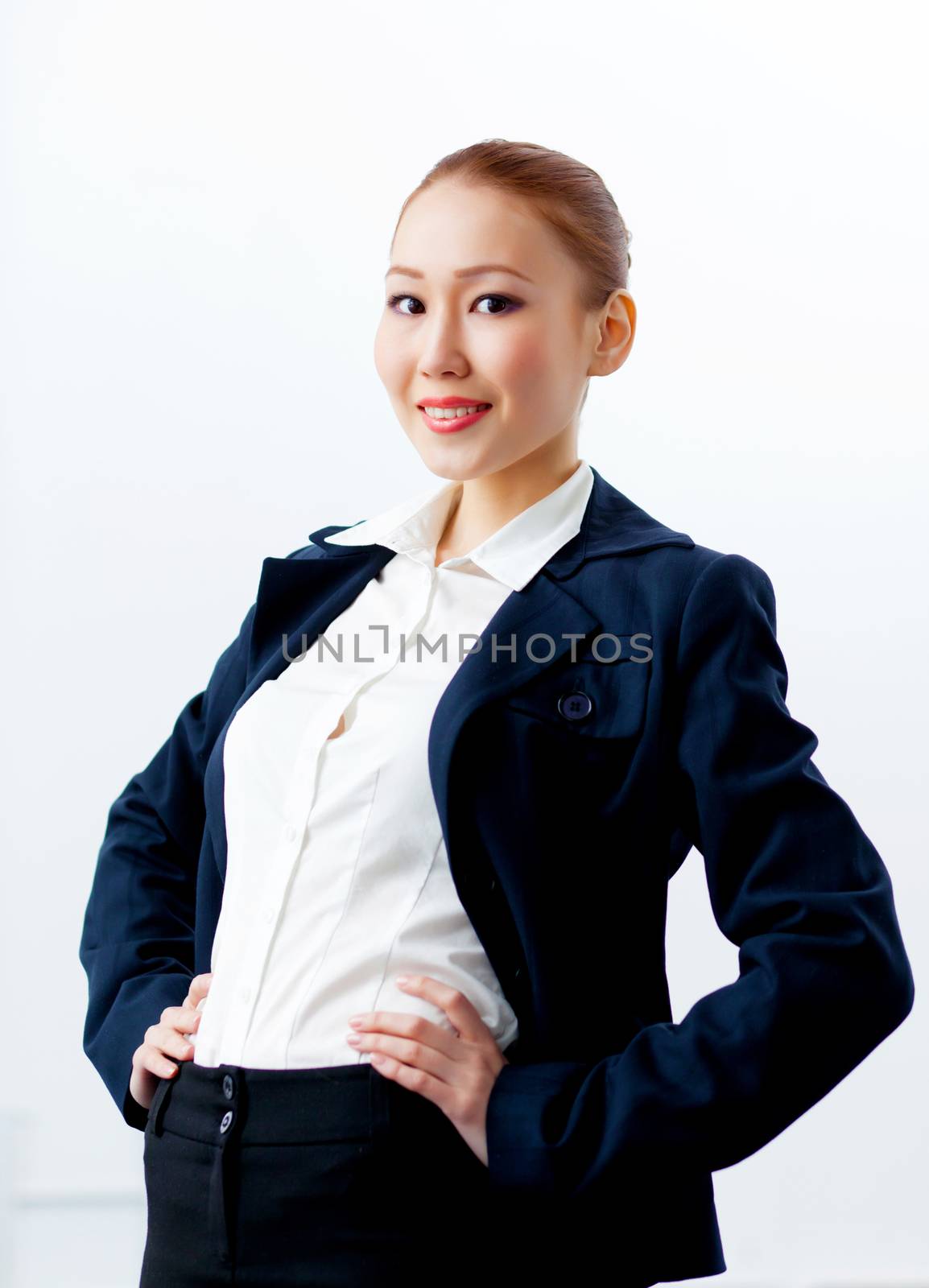 Attractive businesswoman in formal suit by sergey_nivens