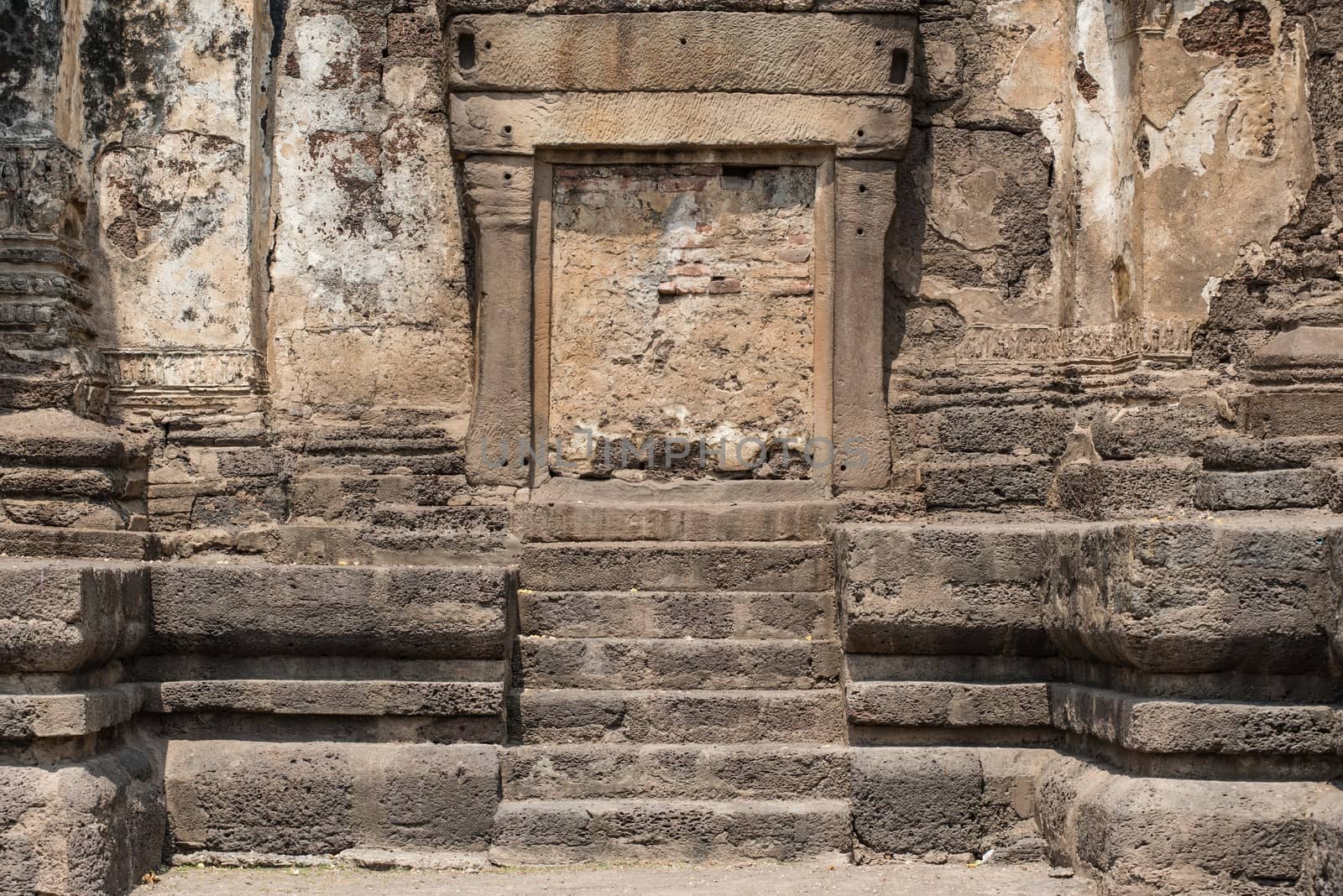 Thailand ancient old temple made from red brick and lime stones, taken on a sunny day