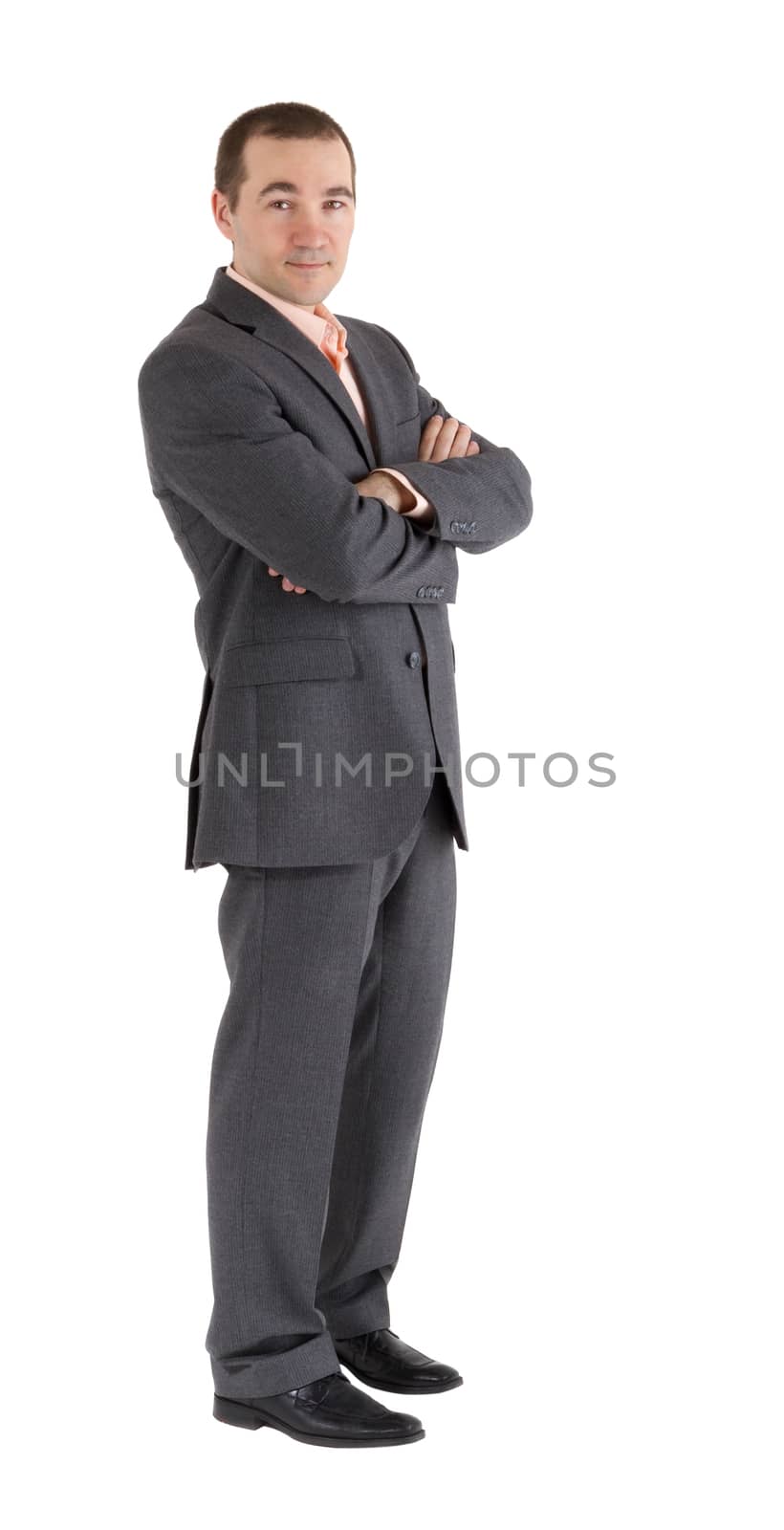 man standing with arms crossed on a white background