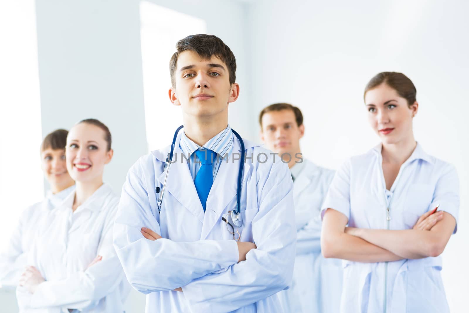 team of experienced highly qualified doctors, fold one's arms