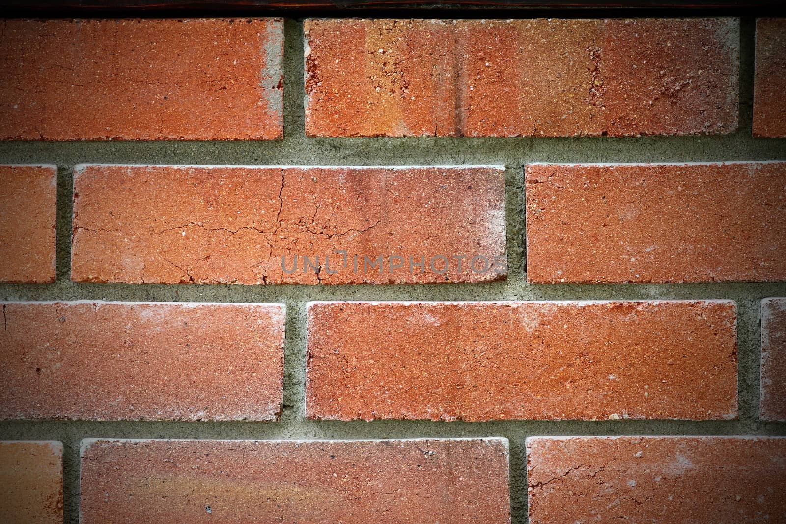 texture of red brickwork with added vignette