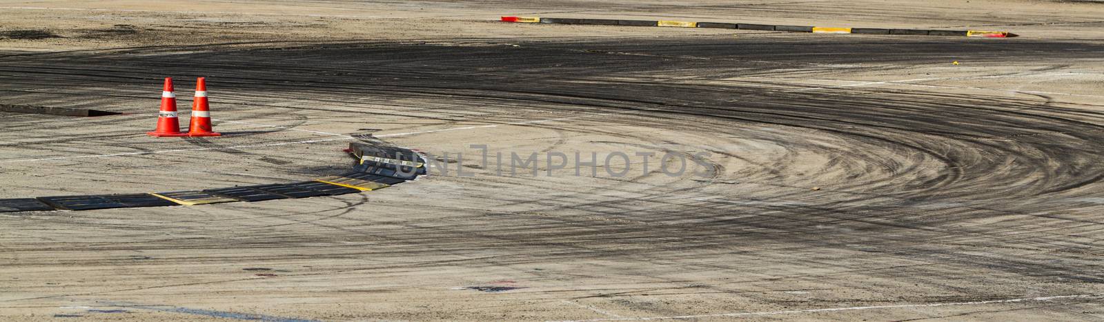 Background with tire marks on road track