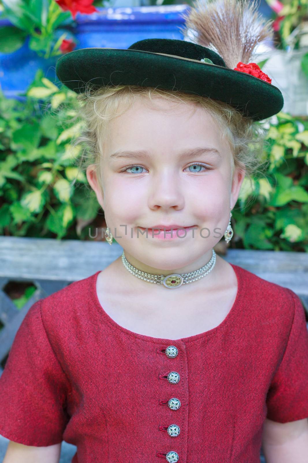 Portrait of a young Bavarian girl with hat by STphotography