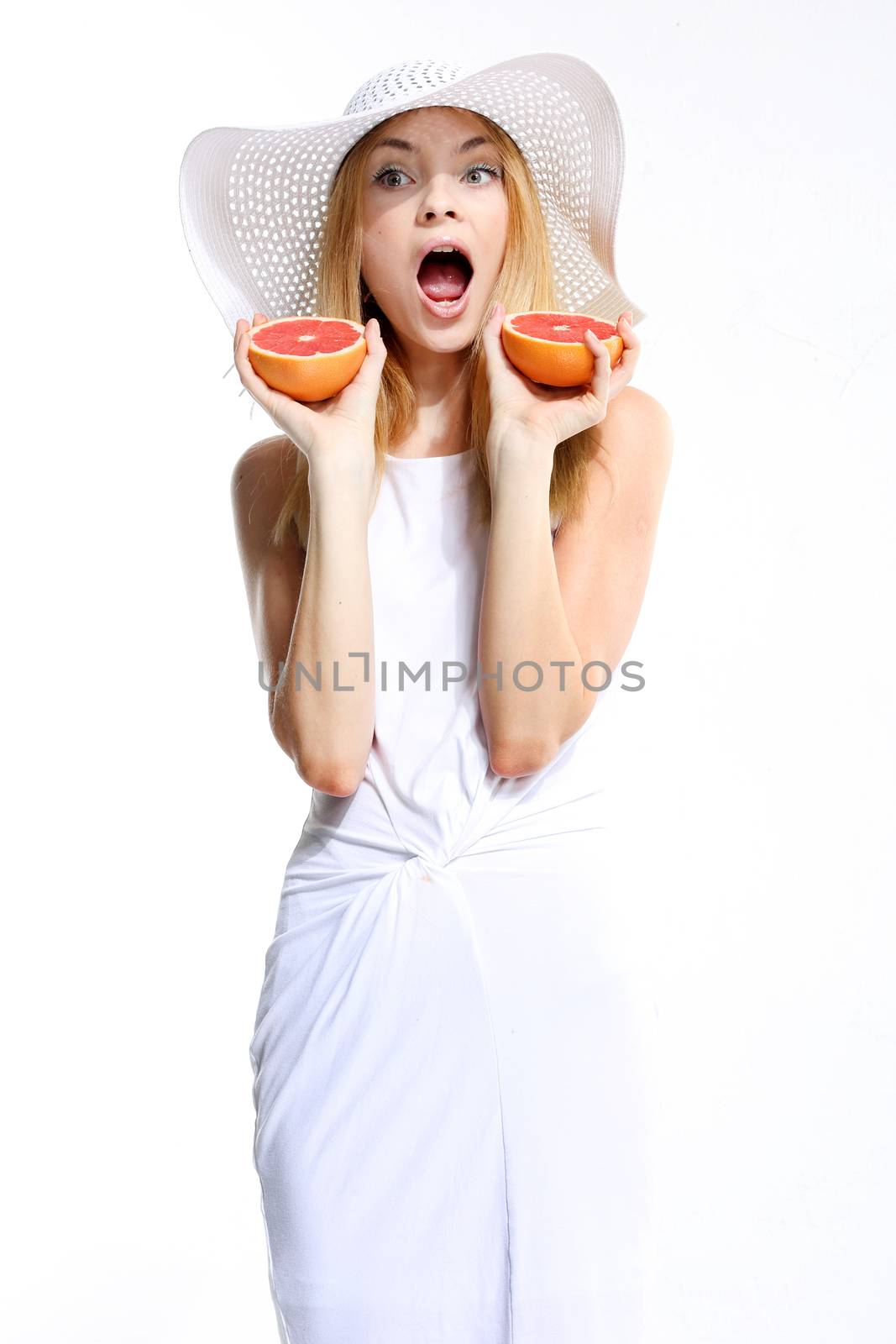 Girl with fresh grapefruit by robert_przybysz