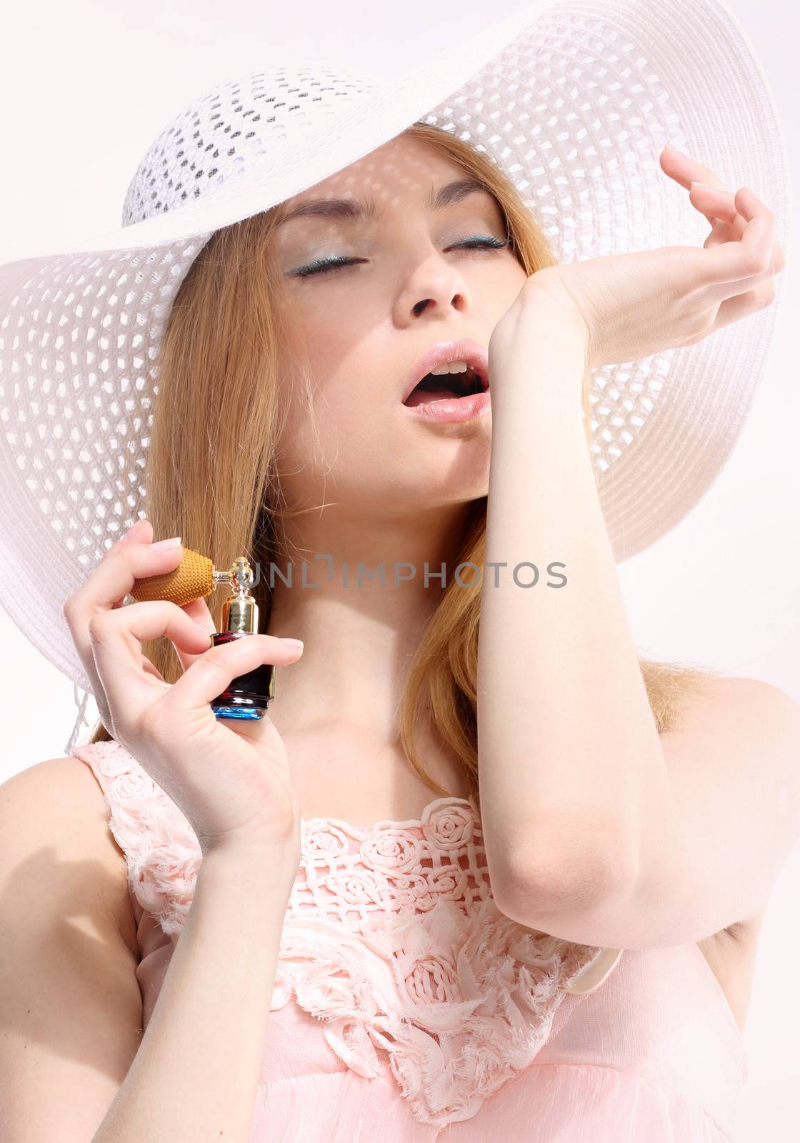 Woman In Sunhat Isolated by robert_przybysz