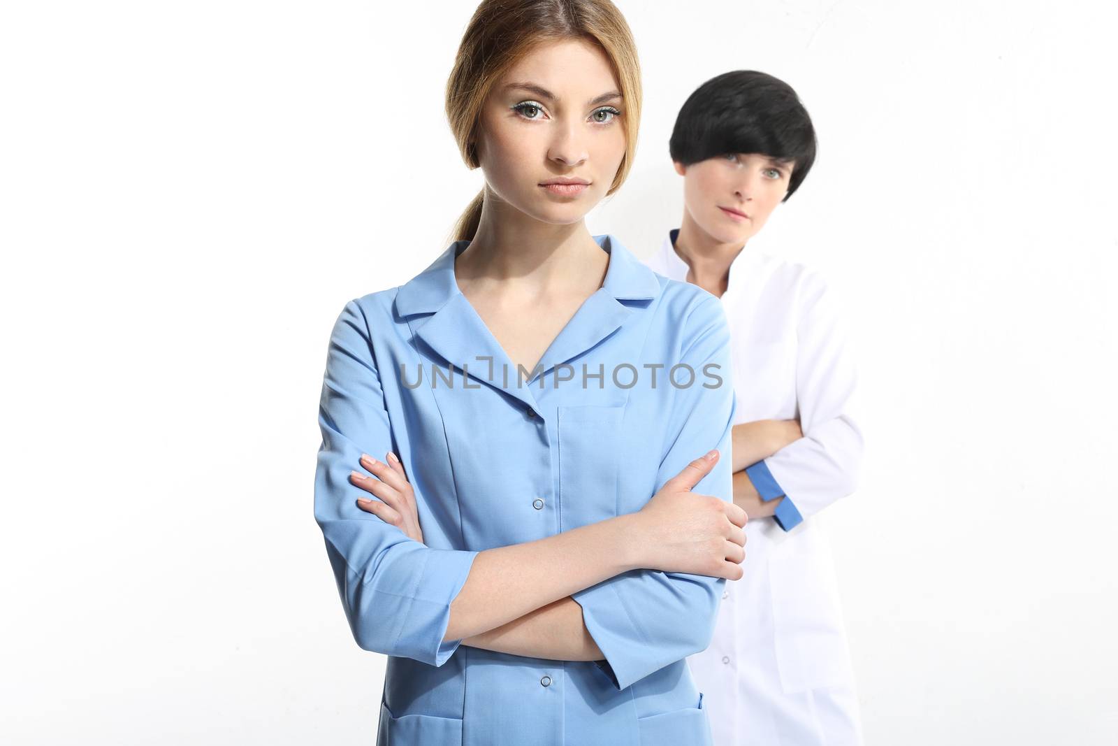 Portrait Of Two Busy Doctors by robert_przybysz