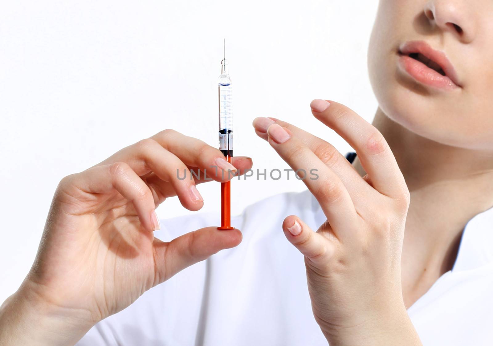 Female doctor with syringe