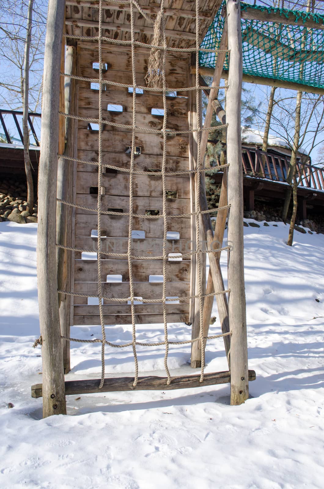 rope climb wooden construction snow winter by sauletas