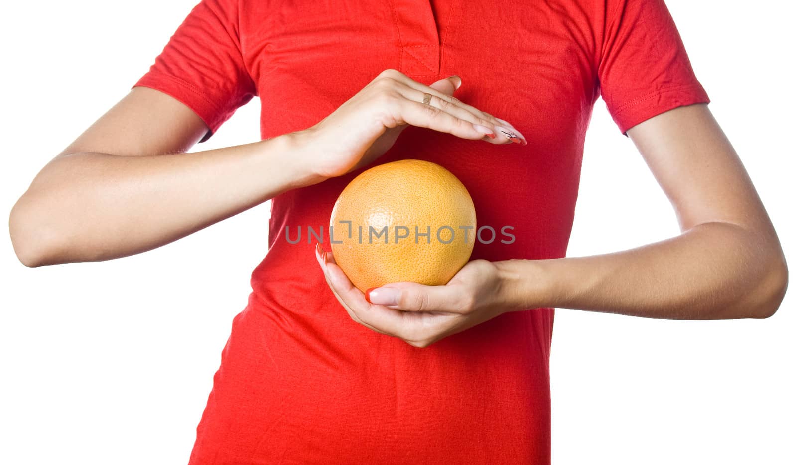 Woman holding a grapefruit. Citrus diet