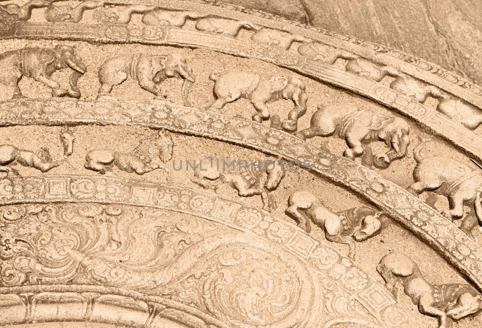 Moonstone relief is ground carving about the cycle of sansara in the ruins of ancient capital of Polonnaruwa, Sri Lanka. 