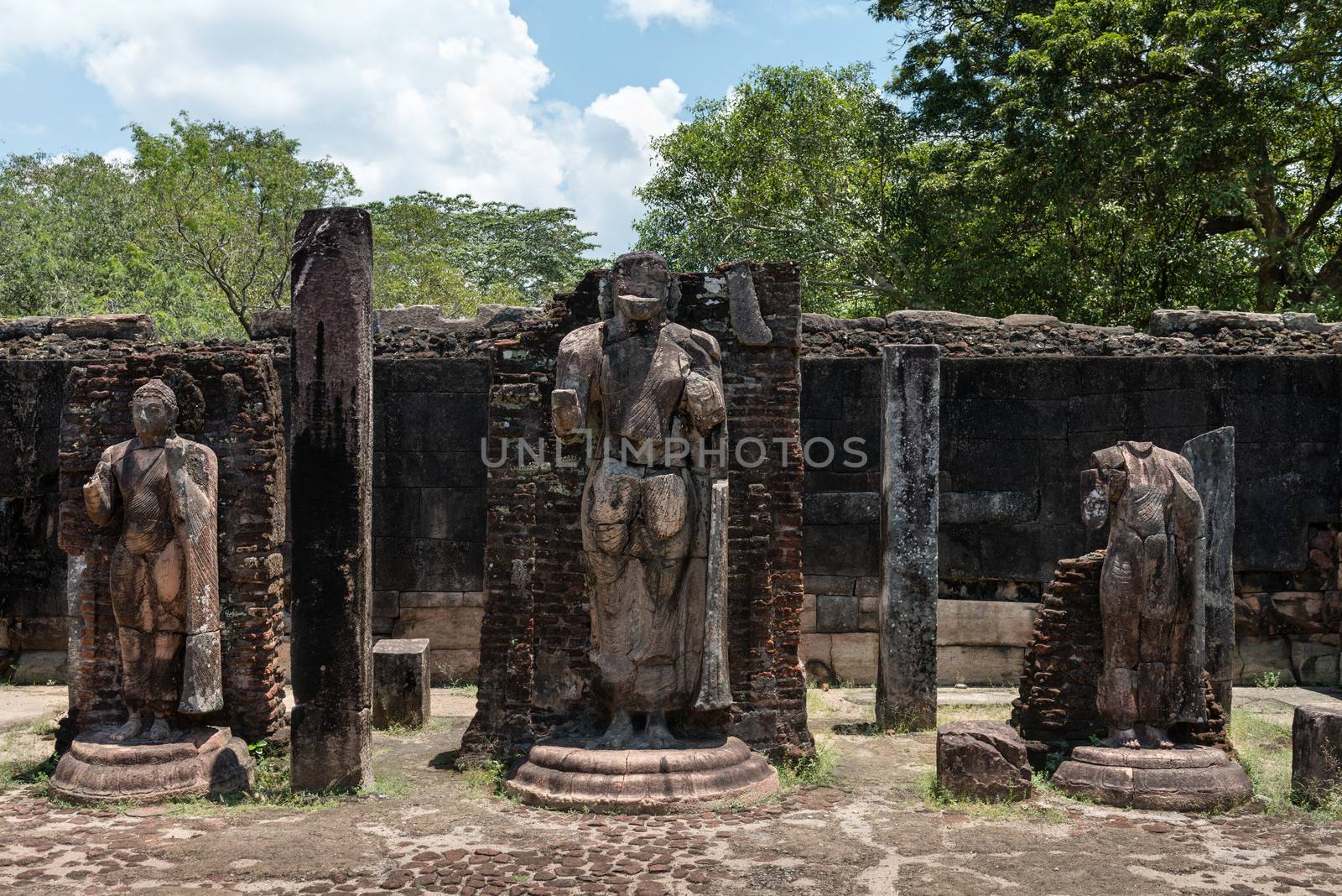 Statues in ancient temple, Polonnaruwa, Sri Lanka.  by iryna_rasko
