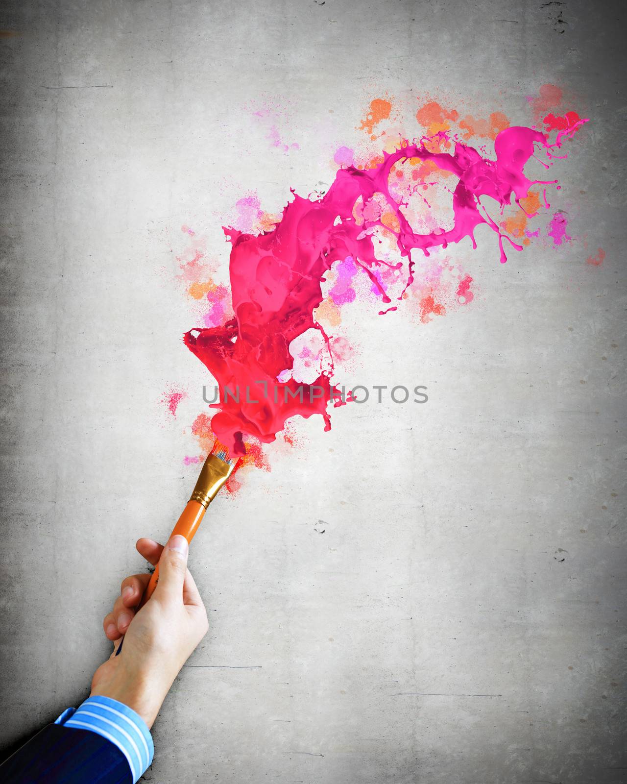 Human hand holding paint brush by sergey_nivens