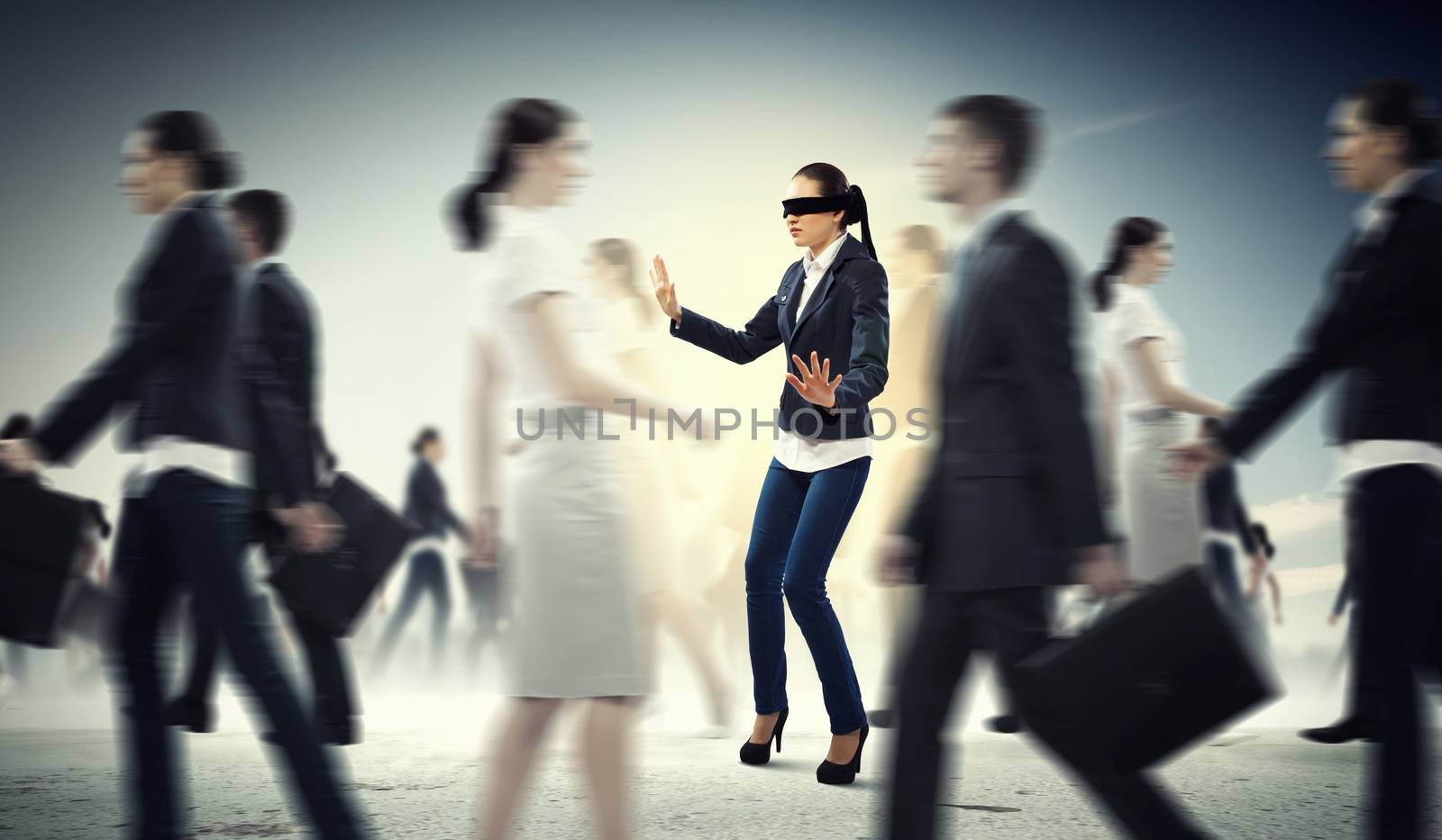 Image of businesswoman in blindfold walking among group of people