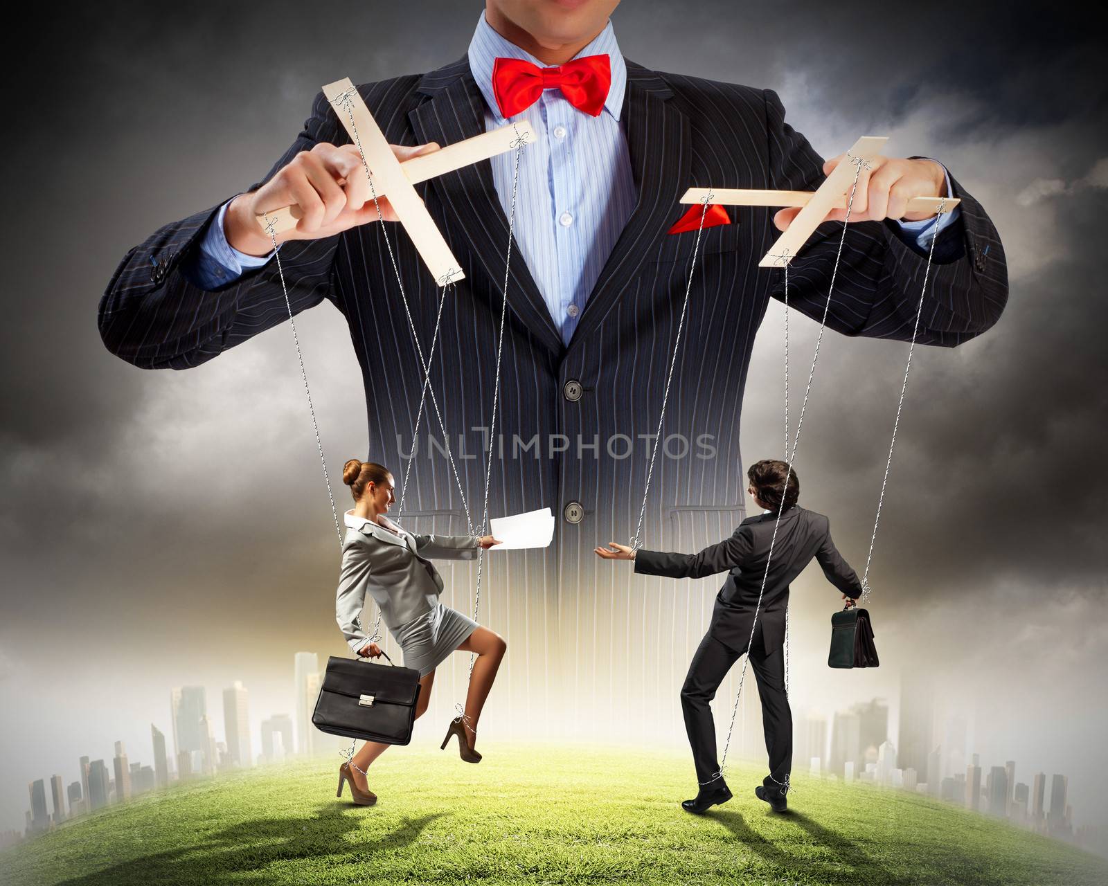 Image of young businessman puppeteer. Leadership concept