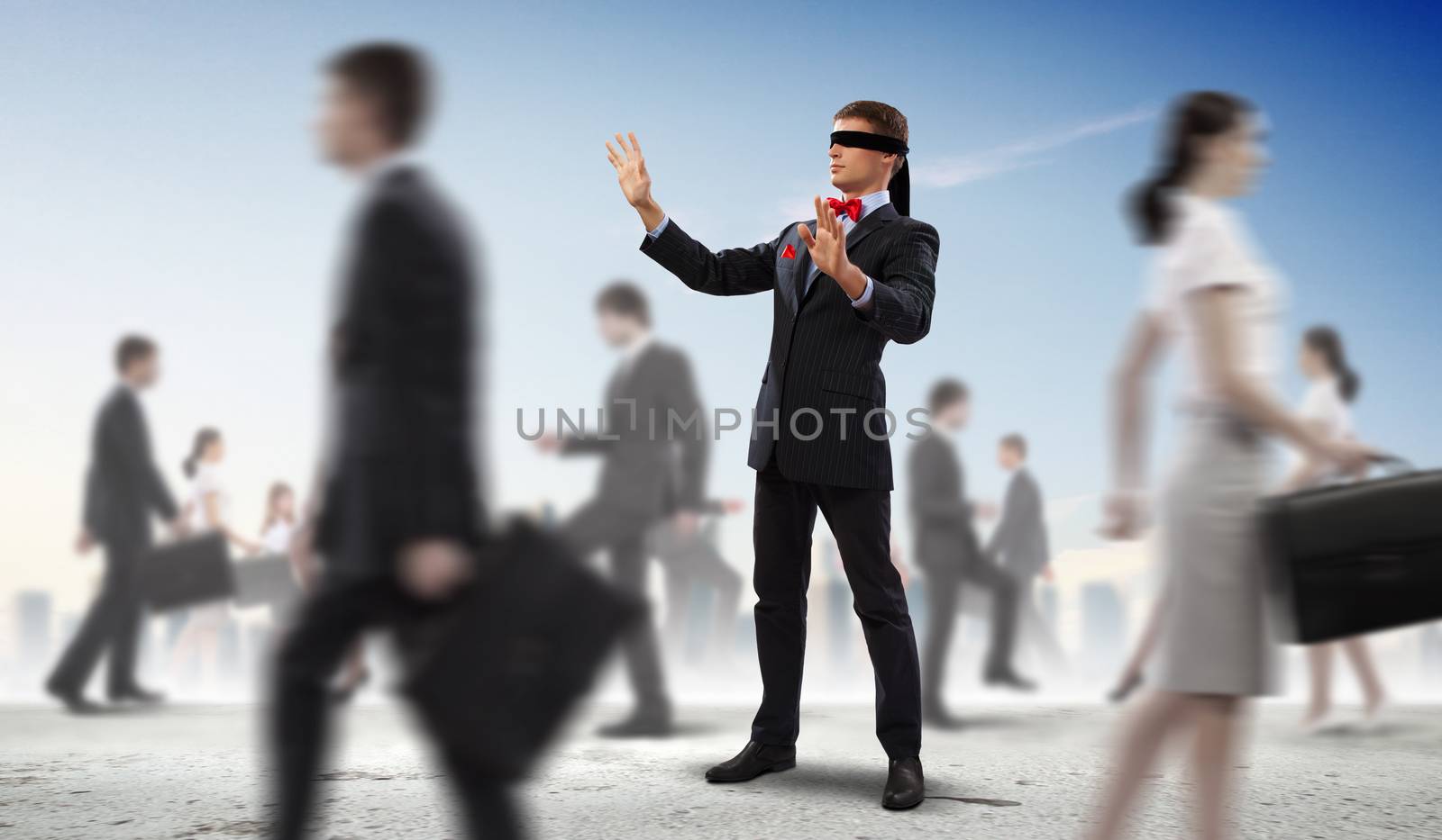 Businessman in blindfold among group of people by sergey_nivens