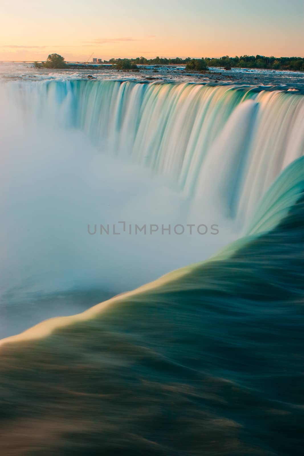 Horseshoe Falls closeup in the morning with mist - Niagara Falls in Canada